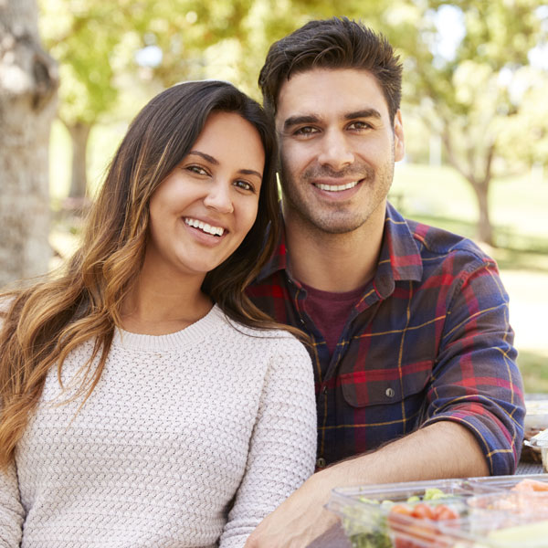 young couple smiling