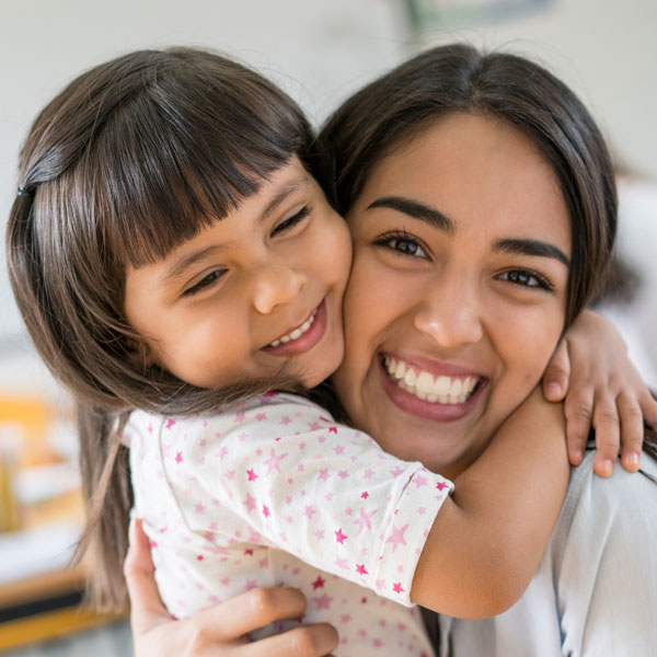 mother and daughter hugging
